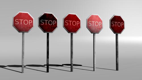 Five grungy and worn stop signs preview image